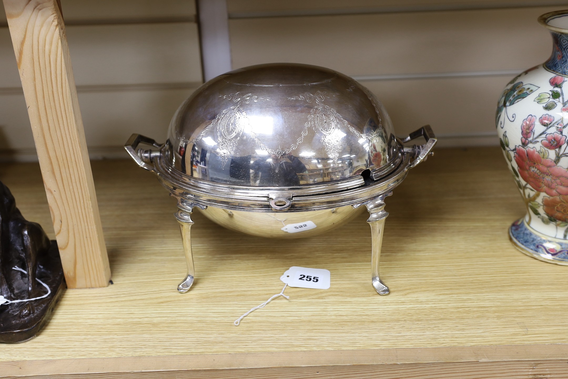 An Edwardian silver plated revolving breakfast tureen. 35cm wide